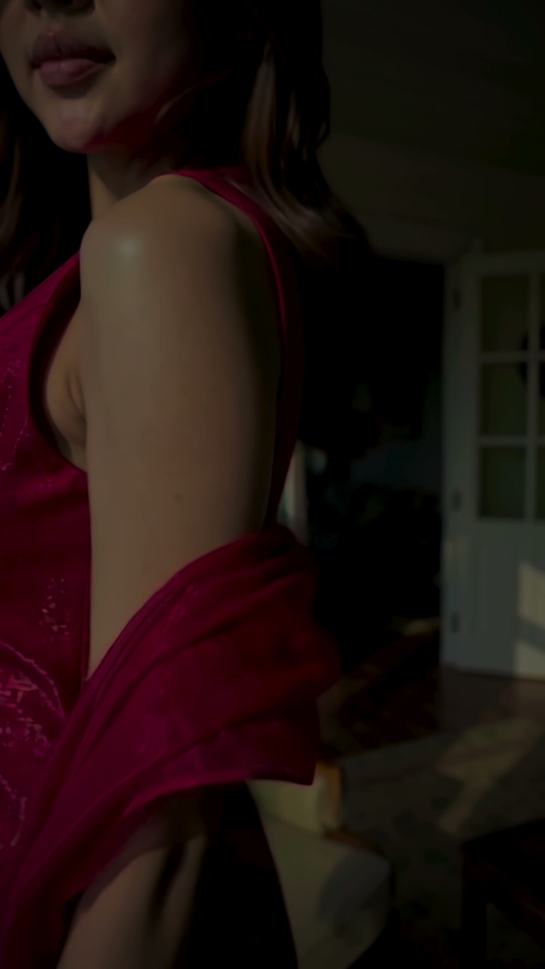 Red silk top and sheer red organza shawl on a sunlit balcony